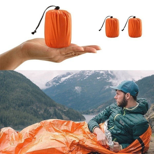 Sovepose for nødstilfeller i orange aluminium